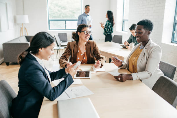 Multi-ethnic group negotiating  in a coworking space